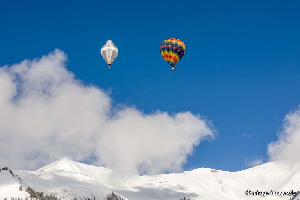 40th International Hot Air Balloon Festival - balloons are flying in the blue sky over the swiss mountain scenery
Château-d’Œx
